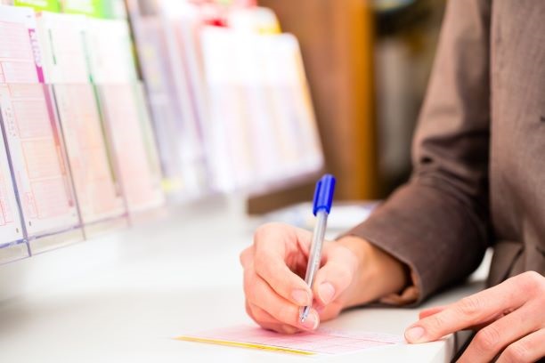 lottoschein mit stift